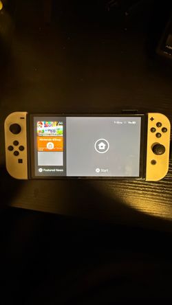 Nintendo Switch OLED with White Joy-Cons
