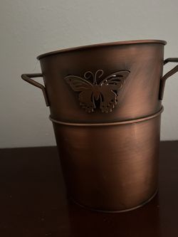 Butterfly metal bucket