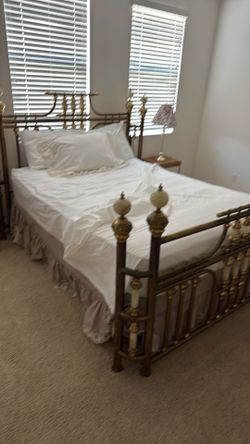 Queen size bed with brass frame