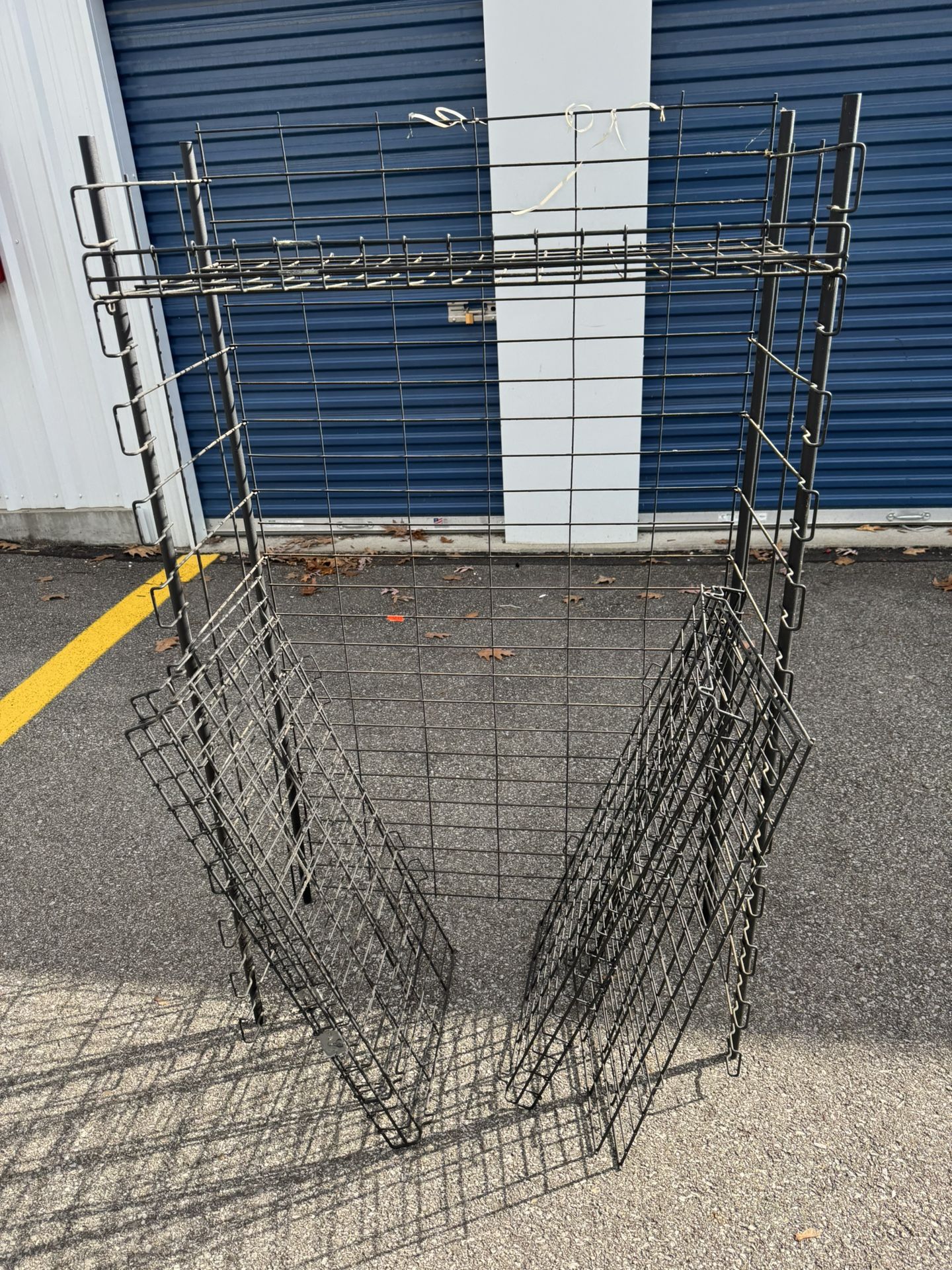 Folding Wire Storage/Display Rack.  36 3/4” wide   19” deep  63” tall  Has 6 shelves 