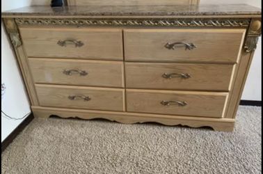 2 dressers 1 with mirror
