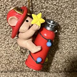 Christmas ornament mouse on fire extinguisher fire fighter