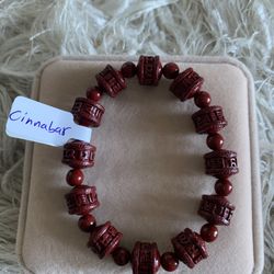 Cinnabar Chinese mantra dharma wheel carving bracelet 