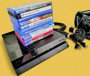 PlayStation 4 PS4 ,11 games and 2 controllers, 2 charging cords and charging cradle , power cable for console and HDMI cable
