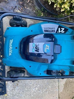 Makita batteries, Charger And Lawn Mower 