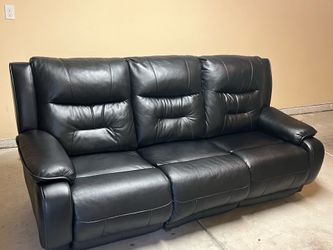 Black leather reclining couch