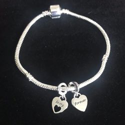 Sterling Silver Charm Bracelet With 2 Sterling Silver Charms 