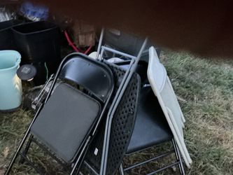 Three folding chairs, a folding black table(needs a little cleaning) one chair also (all for $18