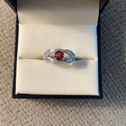 Sterling silver garnet ring with accents