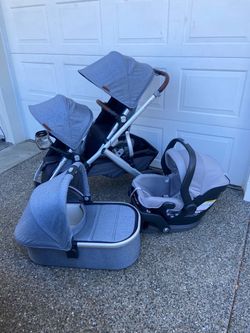 Blue Melange Uppababy V2 Vista Double Stroller with bassinet and car seat