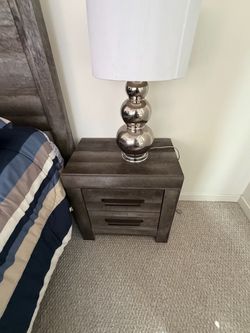 Queen size bed with mattress and side cabinet