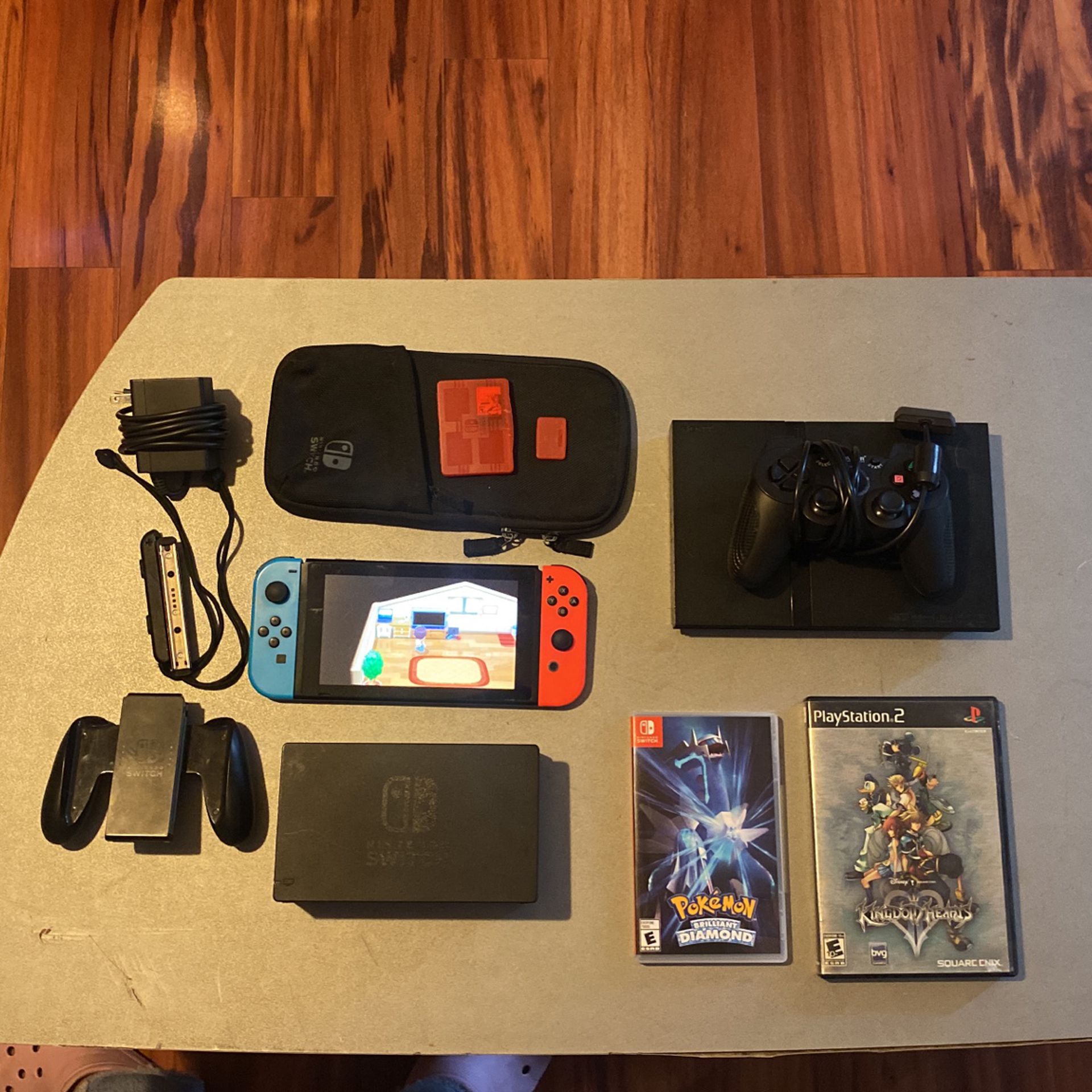 Nintendo Switch + Playstation 2 Bundle (and 3 games)