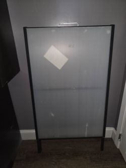 A frame sign holder