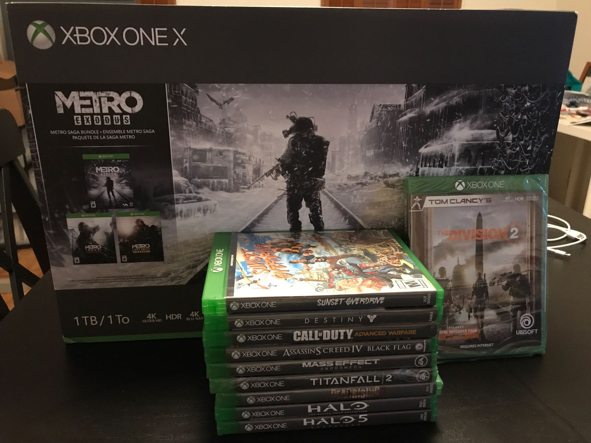 Xbox one x 1 TB metro exodus Bundle + shooters bundle! Endless shooters! Sealed and brand new!