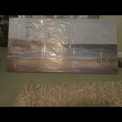 Beach theme picture with lighthouse
