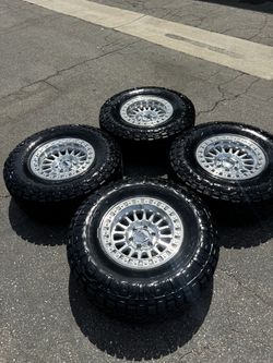 KM552 IMS 6x135 Wheels with 35” Nitto Ridge Grappler Tires Machined