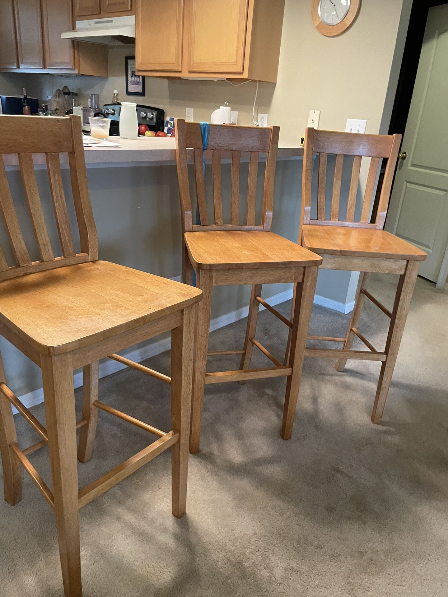 Available for pick up in Wintergarden Florida set of three Wood natural shade barstools for high top counters. it's 29 inches at seat to Floor