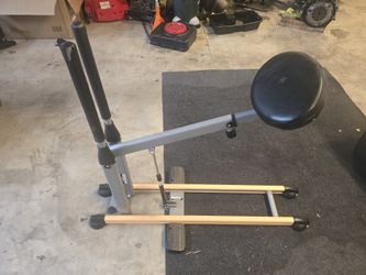 Assisted squat machine