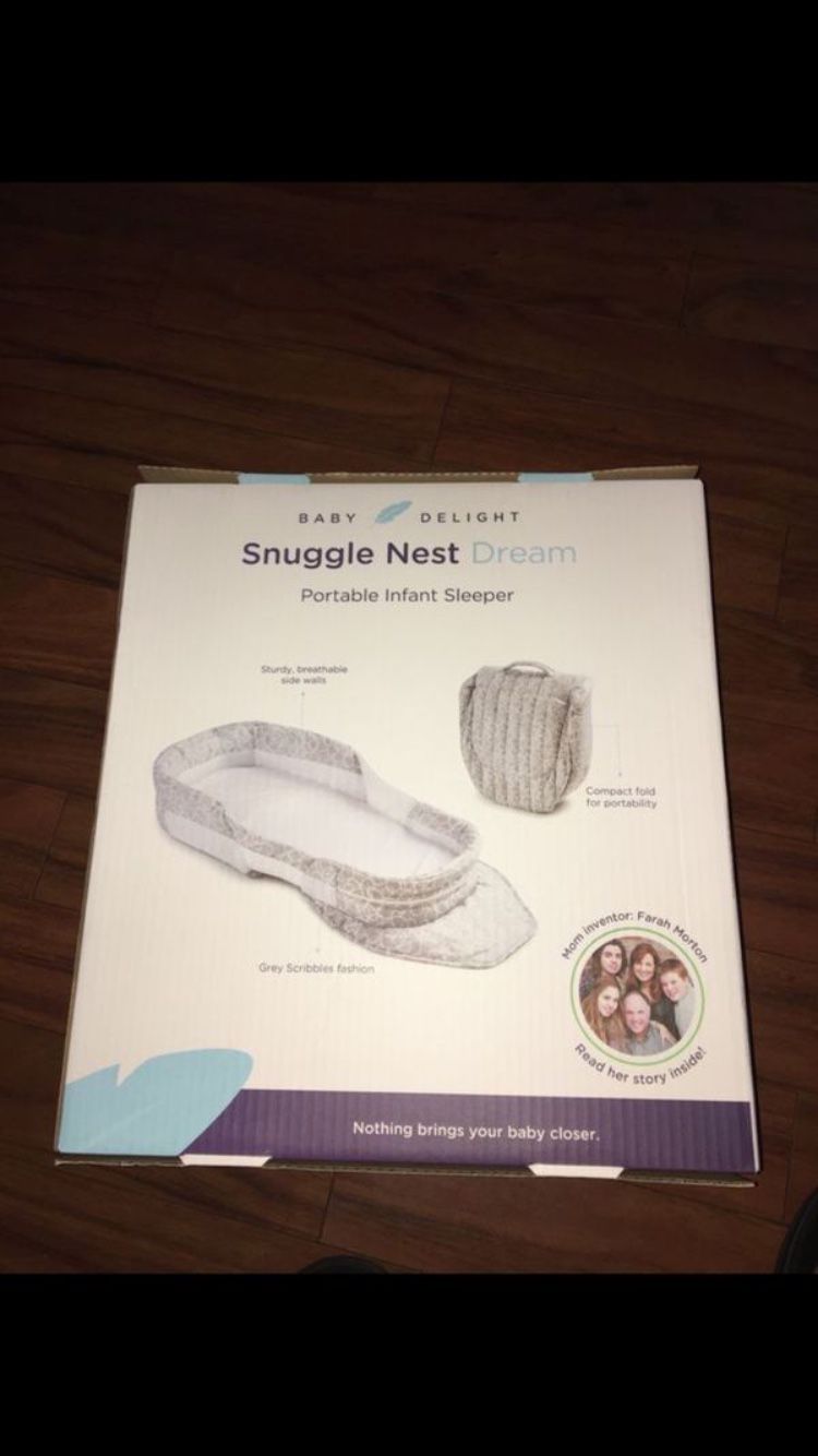 Baby delight snuggle nest dream portable infant sleeper new never been used !