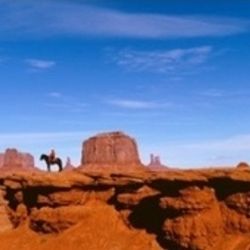 Person riding a horse on a landscape, Monument Valley, Arizona Wall Art
