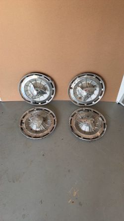 1962 Impala SS hubcaps.  Original with SS spinners