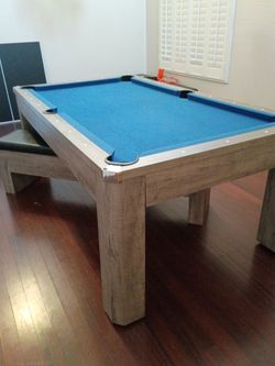 Pool Table with Blue Felt and Wood Frame