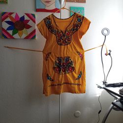 S Hispanic Tumeric Colored Dress