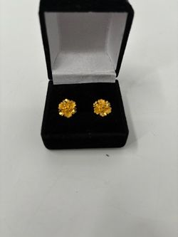 Gold hibiscus earrings