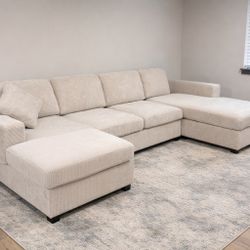 corduroy Sectional Sofa with double chaise and two accent pillows. 