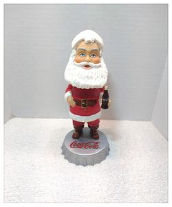 * Excellent Pre-Owned Condition *
** NO Chips or Cracks **
Coca-Cola / Carl's Jr. . . . .
Vintage (2002)
'Santa Claus' Bobblehead
* 7" tall x 3" diame