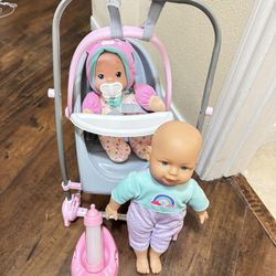 $10 - Baby Swing With Baby And Accessories