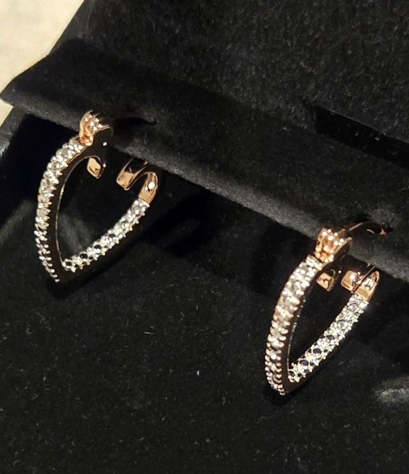 Diamond Accent Inside-Outside Heart Hoop Earrings in Sterling Silver w/ 18K Rose Gold plate.