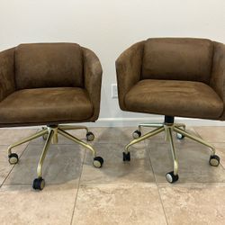 Two Brown Suede Rolling Office Chairs
