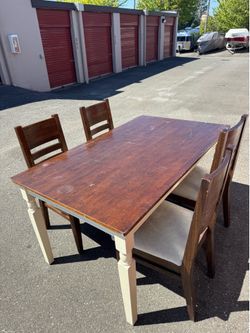 Wooden table and four chairs
