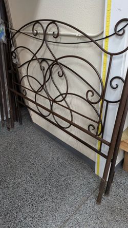 Queen scroll work metal bed frame.