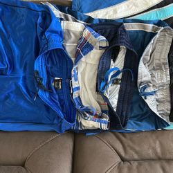5 Men’s Shorts Size L, and 8 T-shirts XL