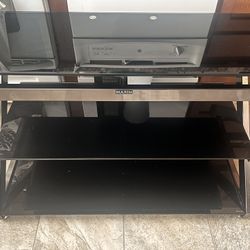 Maxim Magazine Tv Stand Black Tempered Glass.