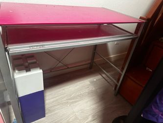 Pink metal desk with glass top