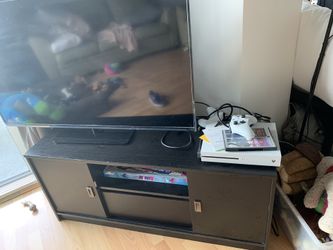 Black tv stand with sliding drawers