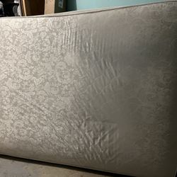 Comfortable queen-size mattress with a supportive innerspring base