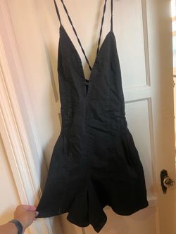 Large tag on denim jumper