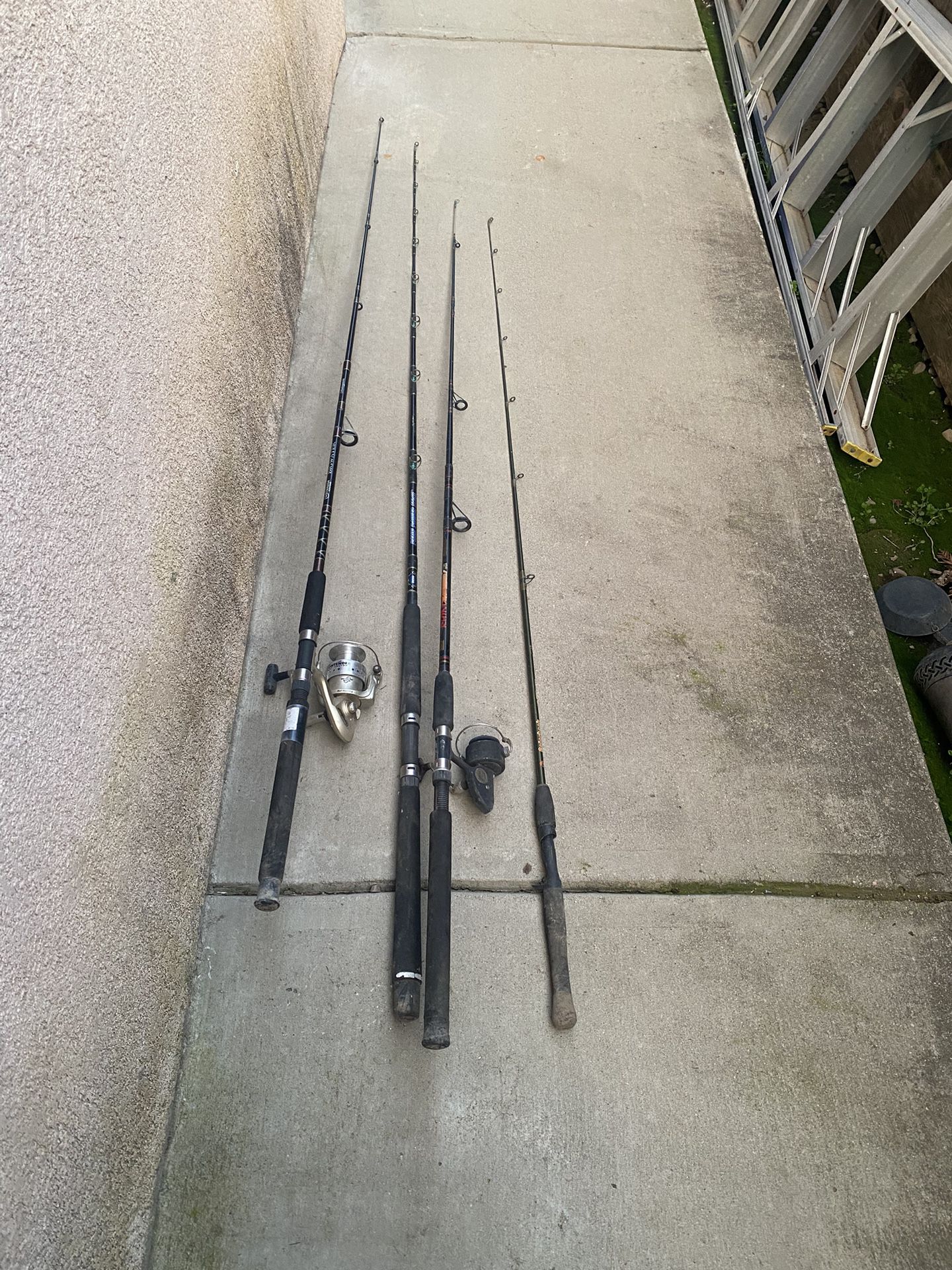 4 Fishing Rods and 2 Reels For$80 All In Good Shape 