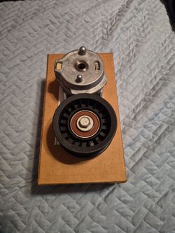 BELT TENSIONER