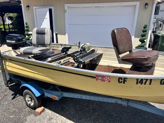 12” aluminum fishing boat with 15 horse Mercury motor, trolling motor