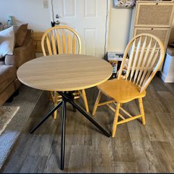 dining table and wood chairs