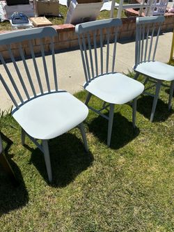 3 gray chairs