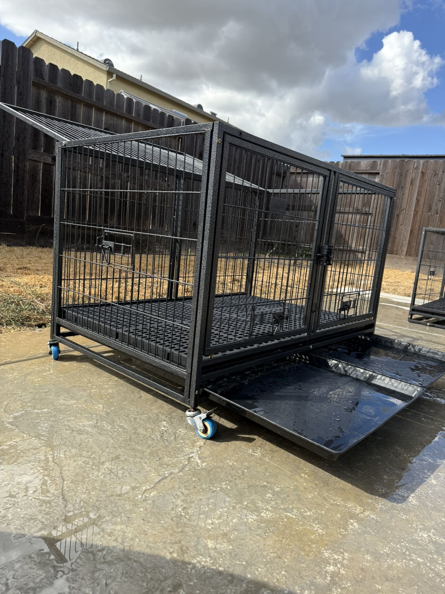 Large Heavy-Duty Dog Kennel with Wheels – $120 (Originally $350)