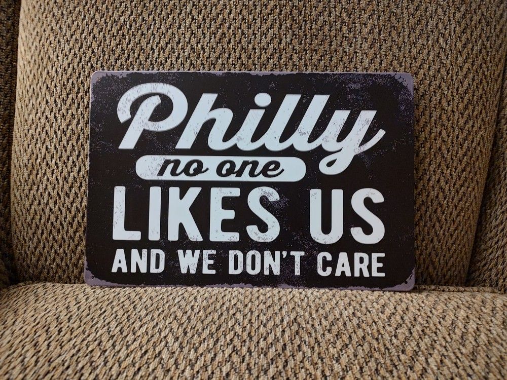 PHILLY NO ONE LIKES US METAL SIGN. 12" X 8". NEW. PICKUP ONLY.