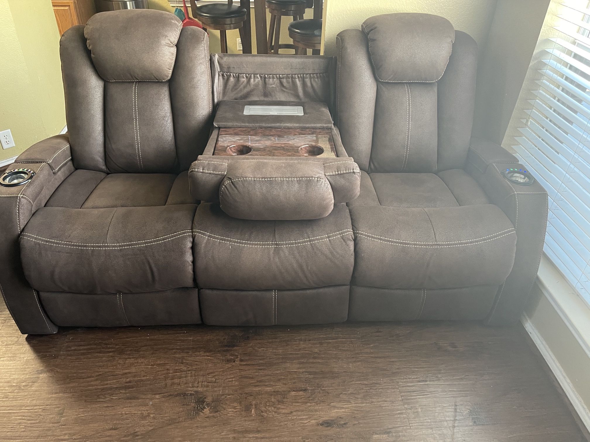 Crestline brown dual 2024 power reclining sofa