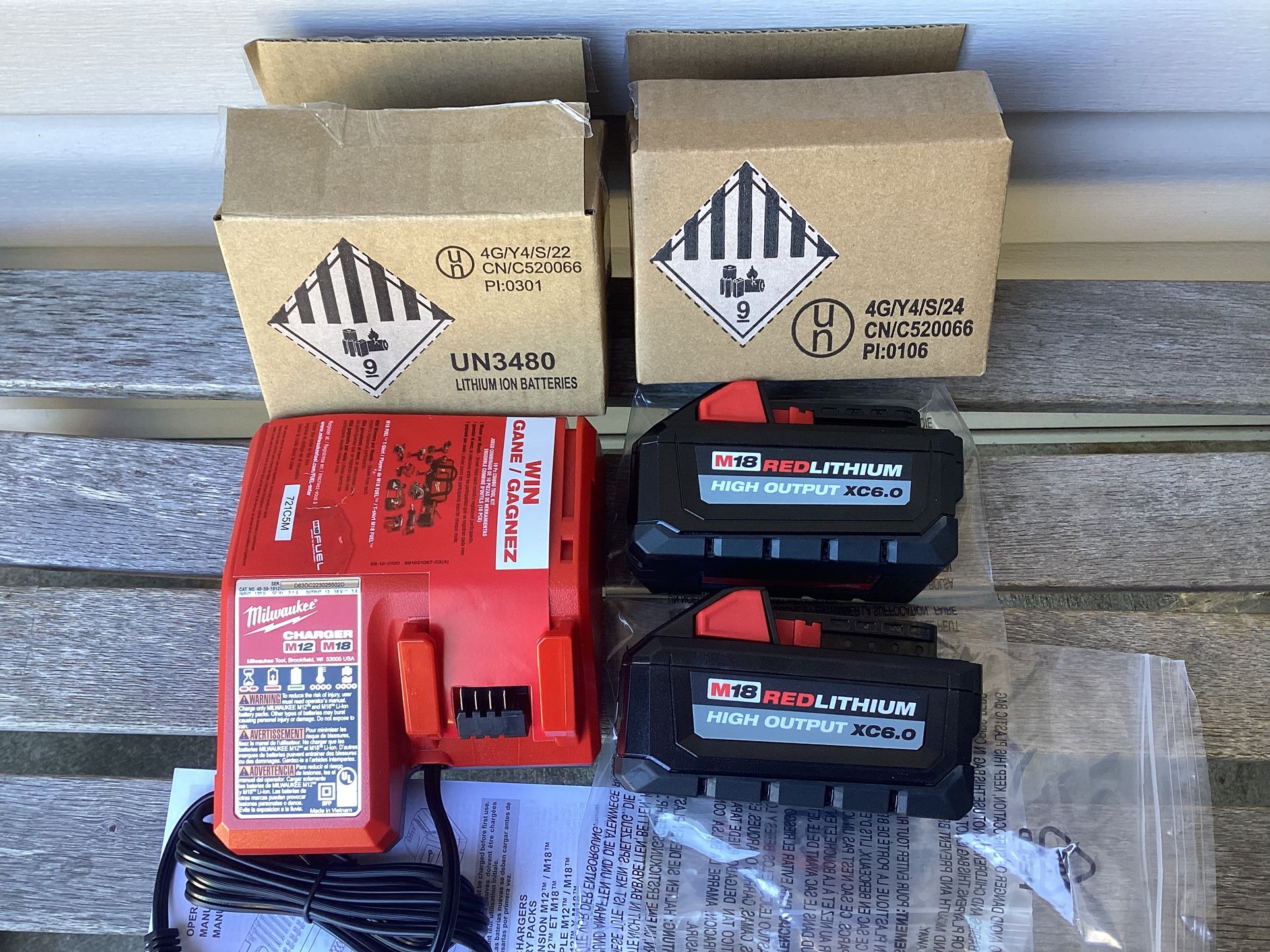 2 Milwaukee M18 Batteries HIGH OUTPUT 6.0 And Charger. Brand NEW. NUEVO.